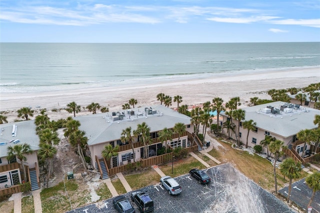 bird's eye view with a water view and a view of the beach