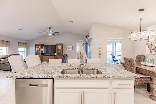 kitchen with pendant lighting, sink, white cabinetry, and dishwasher