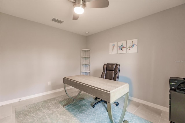 tiled home office with ceiling fan