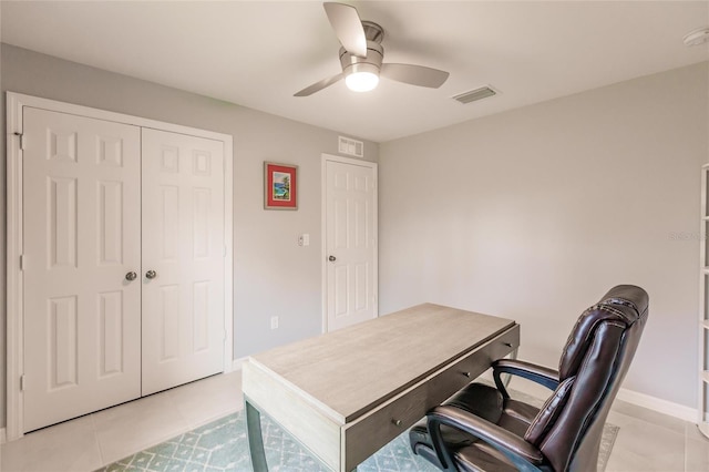 office featuring ceiling fan and light tile patterned flooring