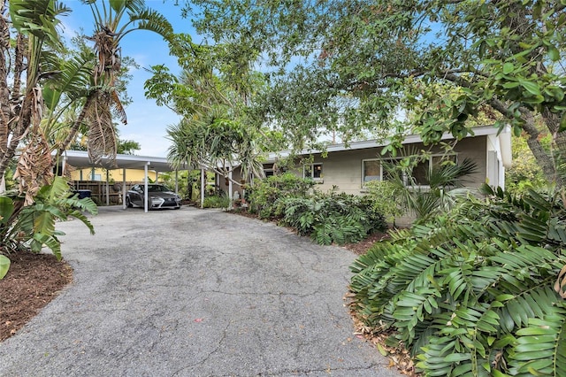 view of front of home with a carport