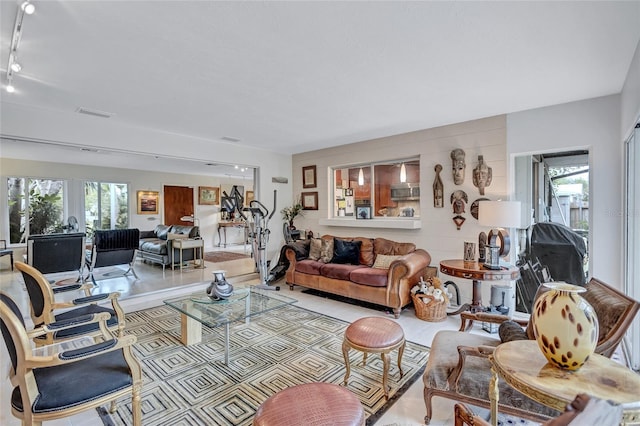 living room featuring plenty of natural light