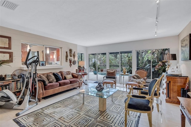 tiled living room with track lighting