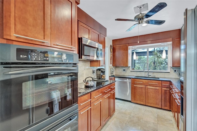 kitchen with backsplash, ceiling fan, sink, and black appliances