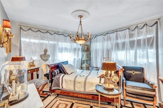 bedroom with a chandelier