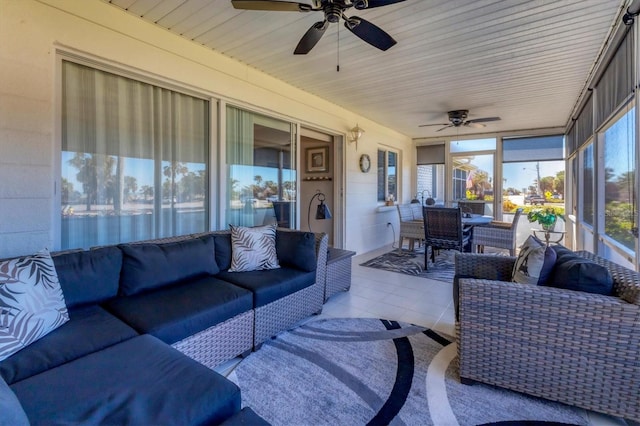 sunroom / solarium with ceiling fan and wood ceiling