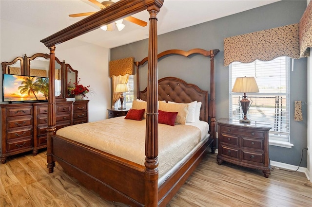 bedroom featuring ceiling fan and light hardwood / wood-style floors