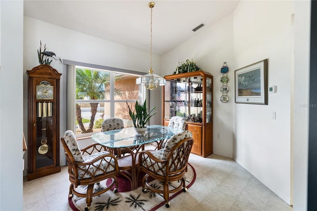 dining room with a notable chandelier