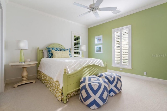 bedroom with multiple windows, ornamental molding, carpet, and ceiling fan