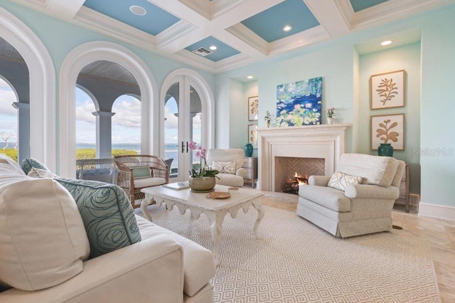 interior space featuring beamed ceiling, crown molding, french doors, and coffered ceiling