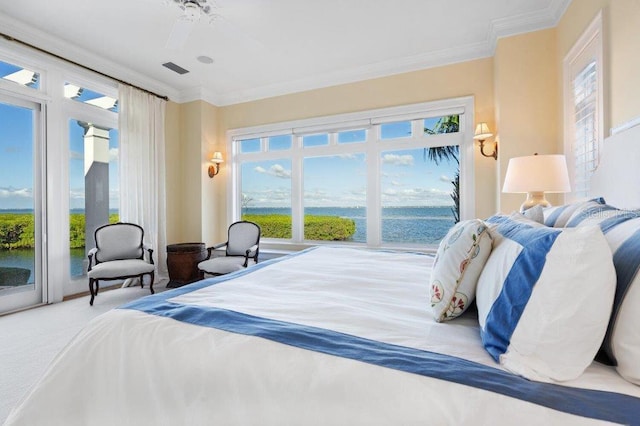 bedroom featuring a water view, crown molding, access to exterior, and carpet floors