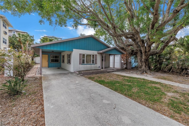 view of front of property with a carport