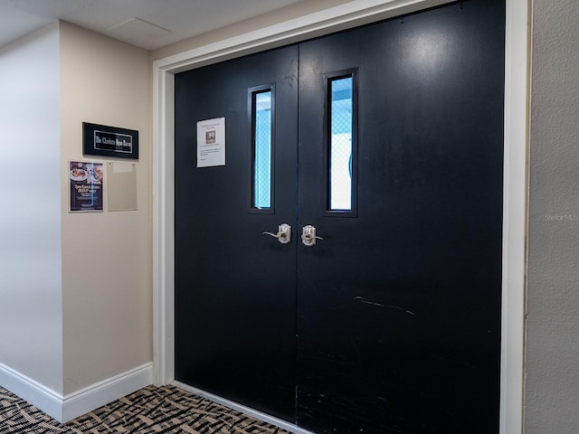 entryway featuring french doors