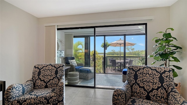 doorway to outside with light tile patterned flooring