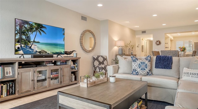 living room with light tile patterned floors