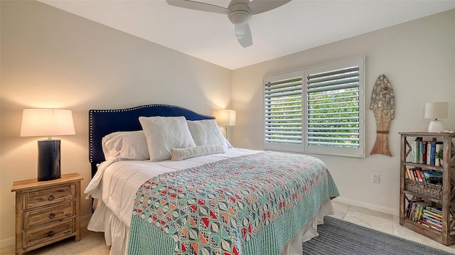 bedroom featuring light tile patterned flooring and ceiling fan