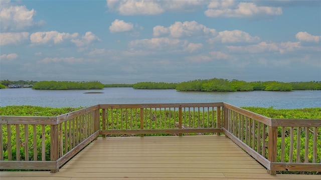 deck featuring a water view