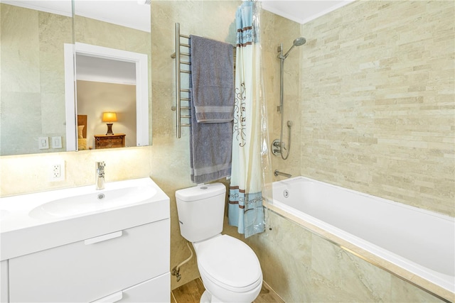 full bathroom with radiator, tile walls, vanity, tiled shower / bath, and toilet