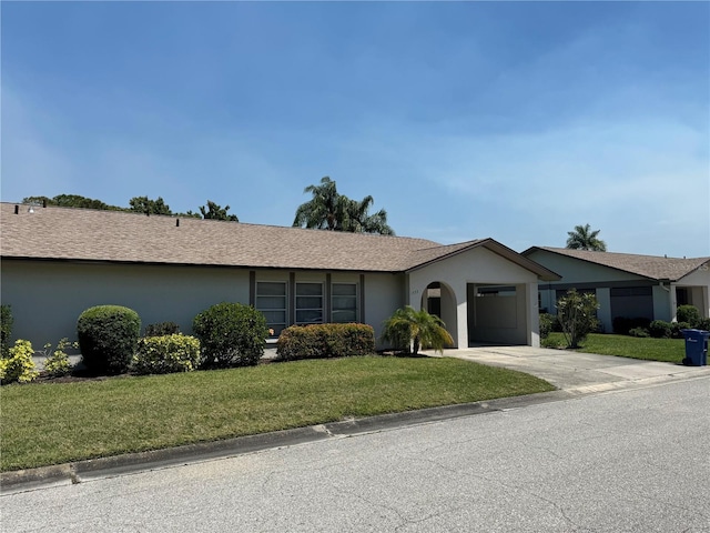 ranch-style house with a front lawn