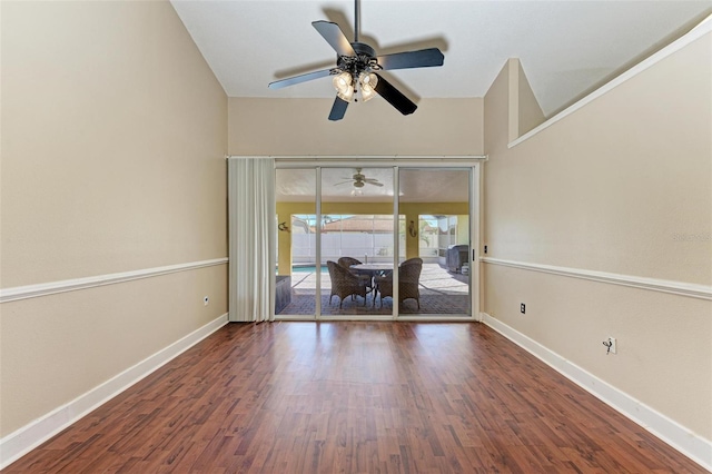 spare room with ceiling fan and dark hardwood / wood-style floors