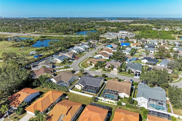 bird's eye view with a water view