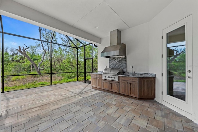 11323 Rivers Bluff Cir, Lakewood Ranch, FL 34202 - exterior space with grilling area, a sink, glass enclosure, and an outdoor kitchen