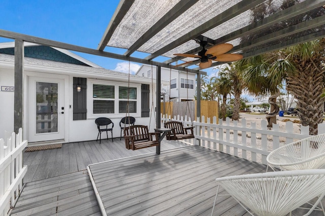 deck featuring a pergola and ceiling fan