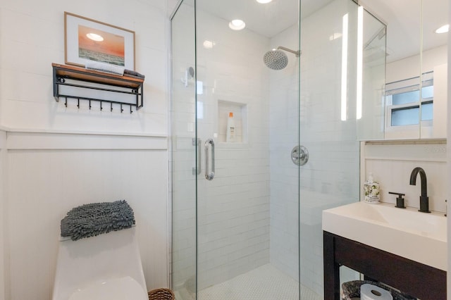 bathroom with vanity and walk in shower