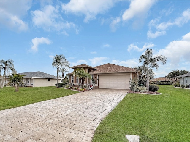 view of front of house with a front lawn and a garage