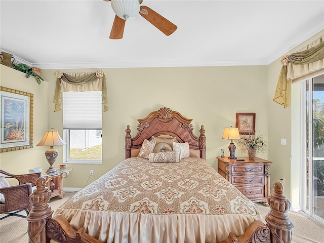 carpeted bedroom with ceiling fan, access to exterior, ornamental molding, and multiple windows