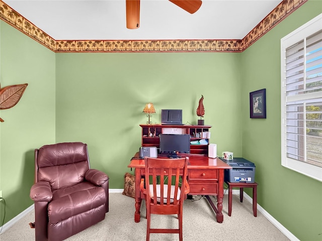 office area with carpet and ceiling fan