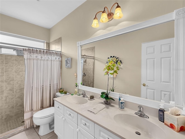 bathroom with walk in shower, vanity, tile patterned floors, and toilet