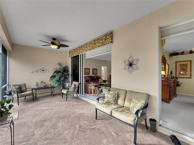 sunroom / solarium with ceiling fan