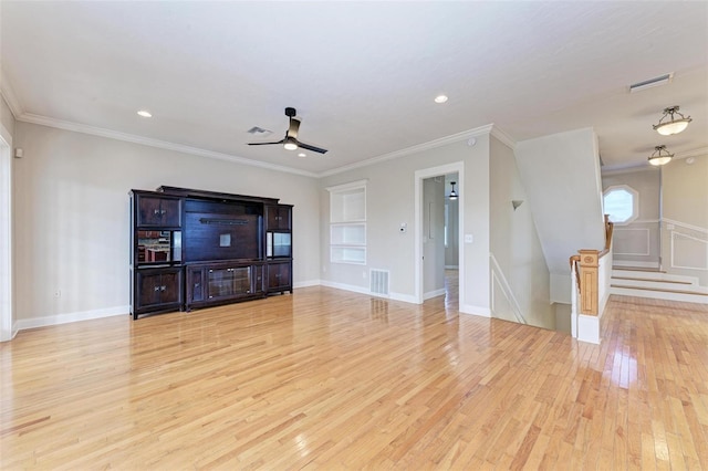 unfurnished living room with ornamental molding, ceiling fan, and light hardwood / wood-style floors