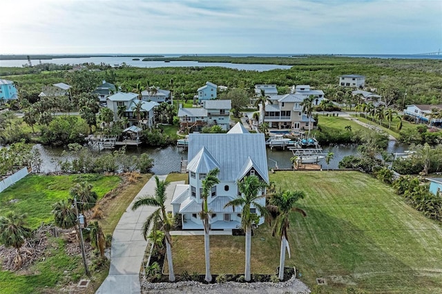 aerial view featuring a residential view and a water view