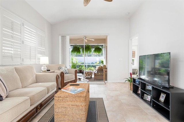 tiled living room featuring lofted ceiling