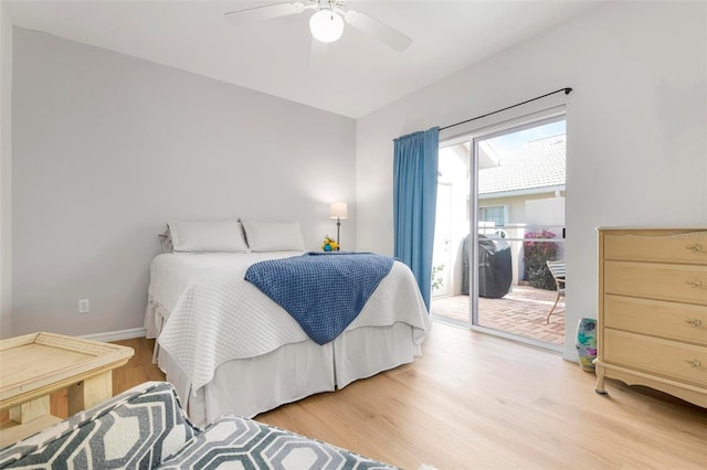 bedroom featuring access to exterior, ceiling fan, and light wood-type flooring