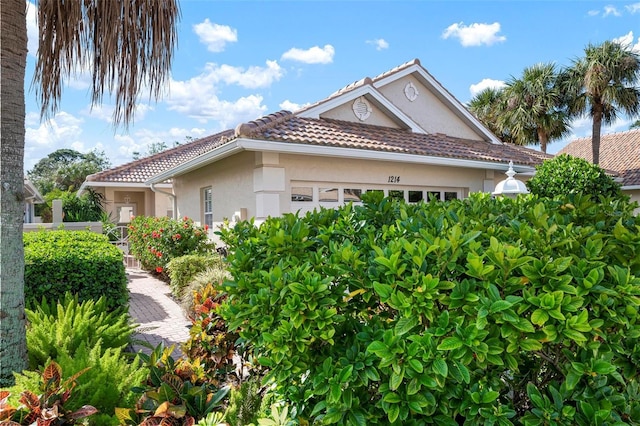 view of property exterior featuring a garage