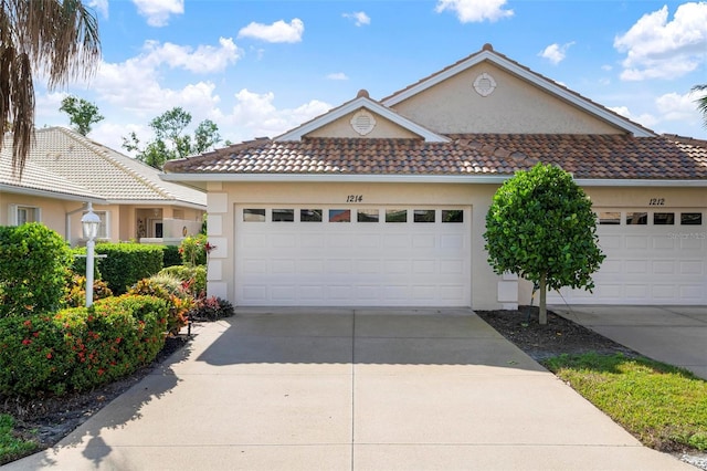 view of front of property with a garage