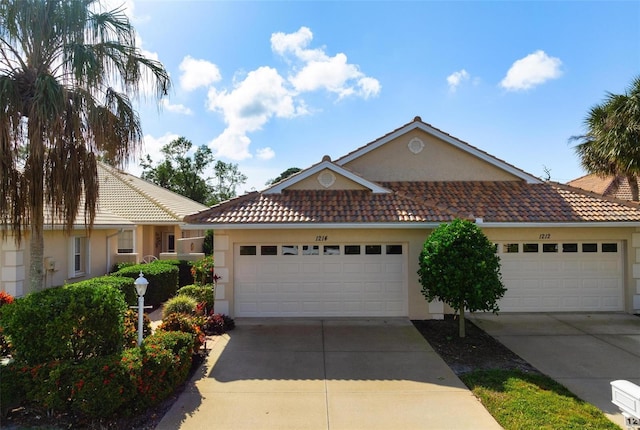 ranch-style home with a garage