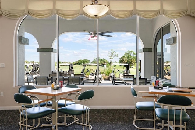 view of carpeted dining area