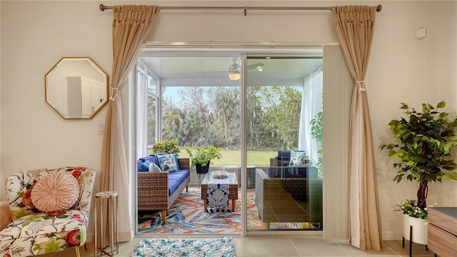 doorway to outside featuring light tile patterned flooring