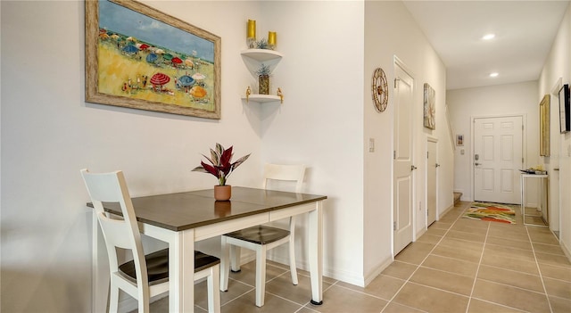 interior space with light tile patterned floors