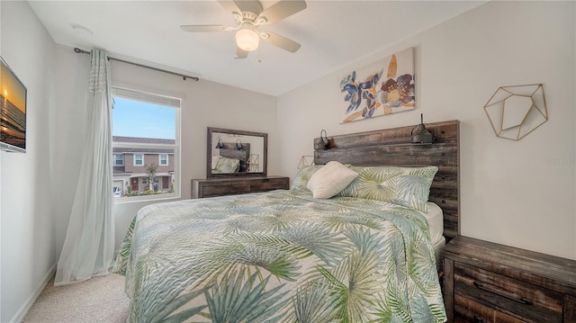 bedroom with ceiling fan and carpet flooring