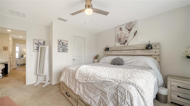 carpeted bedroom with ceiling fan