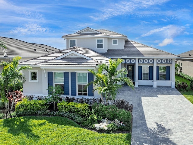 view of front of property with a front lawn