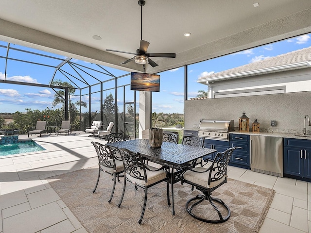 view of patio featuring glass enclosure, area for grilling, a grill, sink, and pool water feature