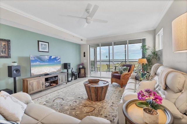 living room with ceiling fan, ornamental molding, and light tile patterned flooring