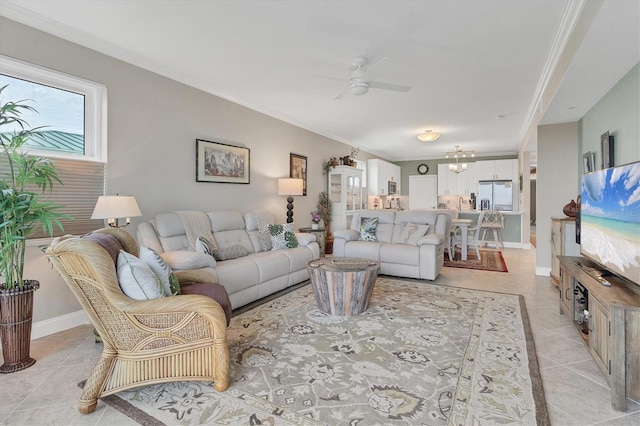 tiled living room featuring a wealth of natural light, crown molding, and ceiling fan with notable chandelier