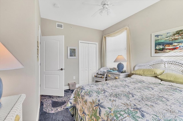 bedroom featuring ceiling fan and a closet